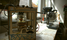 photo of a 3D printer in a chaotic environment