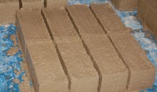 a pallet of freshly made bricks