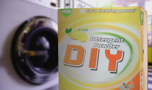 A box of laundry powder called 'DIY' in front of a row of washing machines